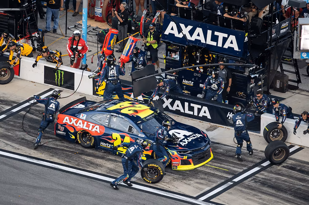 Pit crew servicing a race car at Daytona International Speedway in Daytona Beach, Florida