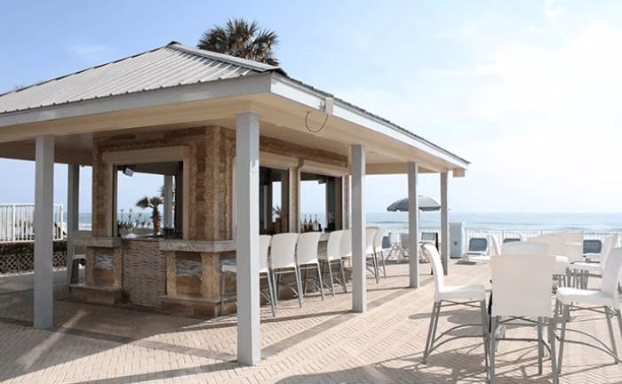 Oceanfront beach bar and seating area in Daytona Beach, Florida